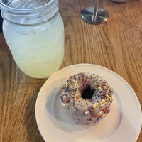 Vegan Lemon glazed blueberry donut and lemonade   at The Corner Beet in Denver
