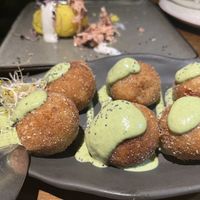 croquetas de parmesano y tomate seco  at La Encomienda in Madrid