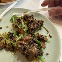 Middle eastern arepa (so good we started eating already)  at Manna Life Food in Miami