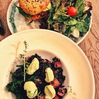 vegan burger and tofu, black rice, tahini avocado sauce at Manna Manna in Brasov