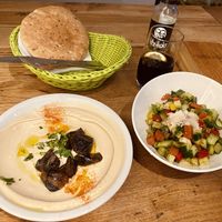Hummus with mushrooms & israeli salad  at Hummus & Friends in Berlin
