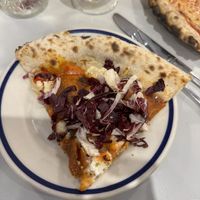 Te Kā - 22 (v+, n)
spicy vodka sauce, numu mozz, cashew ricotta, peppadews, caramelized onion, be-hive pepperoni, mellody hot honey, radicchio, oregano, lemon  at Talula's Pizza in Asbury Park