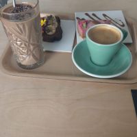 Breakfast menu with coffee, smoothie, banana bread and raw cake at Oh my Goodness in Helsinki