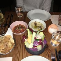 House-made hummus and smoked tomato dips with veg scoops and mini papadum discs...great cocktails and wine list at Nix in New York City