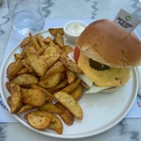 The Beyond Meat burger with vegan mayonnaise. Also received a lot of very tasty potatoes on the side.   at Distrato Cafe in Paros