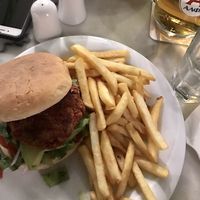 vegan burger & fries! their homemade beet patty & avocado  at Distrato Cafe in Paros