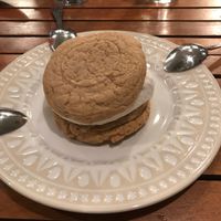 vanilla ice cream sandwich on a peanut butter cookie  at Holi Vegan Kitchen in North Miami Beach