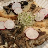 Mushroom pizzeta at Holi Vegan Kitchen in North Miami Beach