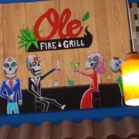 restaurant logo and decor at Ole Fire Grill  in Melbourne