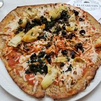 Black olives, artichokes, spinach w/vegan mozzarella at Pizza by Elizabeths in Greenville