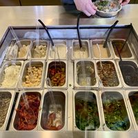 Choose your toppings at Ciao Italian Grill  in Oxnard