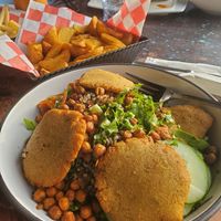 From left to right, Side of Fries, Side of Potatoes, and Nourish bowl with Falafel at Umbrellas Beach Bar in St Georges