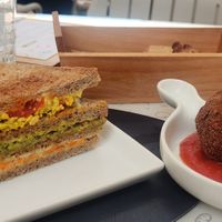 Club sandwich (4,5€) and arancino (4€). at Black Sheep Raw • Vegan Lab & Bistrot in Trento