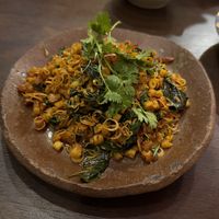 Scrambled coconut, tempeh with basil leaves and lemongrass.  at Pi Vegetarian Bistro in Ho Chi Minh City