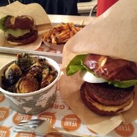 Beyond Burgers with Vegan Pretzel Buns. Sides of fries and Brussels Sprouts (without goat cheese). at Yeah Burger - Howell Mill Rd in Atlanta