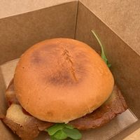 Vegan bacon roll/BLT I think on a brioche style roll  at The Flame Tree Cafe in Dundee