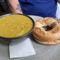 Curried vegetable soup plus vegan haggis bagel   at The Flame Tree Cafe in Dundee