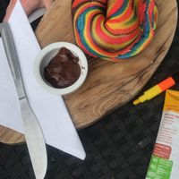 Rainbow bagel  at The Flame Tree Cafe in Dundee