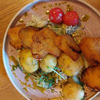 Oyster mushroom chops on young cabbage at Veganic in Krakow