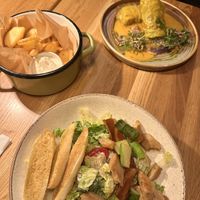 Cabbage Rolls (furthest) Crispers fries and Vegan Cezer Salad (closest)  at Veganic in Krakow