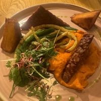 Smoked tempeh with gratin and veggie   at Veganic in Krakow