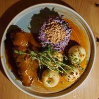 Silesian roulade and noodles with spices purple coleslaw at Veganic in Krakow