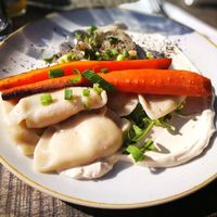 main dish: homemade dumplings (pierogis?) with vegan sour cream  at Veganic in Krakow