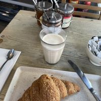 vegan croissant, chai latte with oat milk and jam and choclate cream  at Le Pain Quotidien - Exhibition Rd in South West London