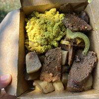 tofu , potatoes, “sausage” and peppers  at Fire & Spice Vegan Restaurant - Capitol Ave in Hartford