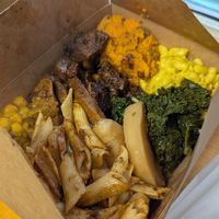 8 dish sampler at Fire & Spice Vegan Restaurant - Capitol Ave in Hartford