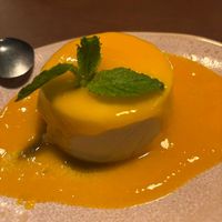 "Panacota dos sonhos" (com leite vegetal e baunilha natural, finalizada com coulis de manga e hortelã) at Casa Raw in Sao Paulo