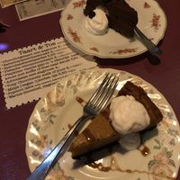 Chocolate fudge cake & salted caramel cheesecake with vegan whipped cream at Kult in Groningen
