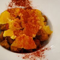 Savory bread pudding with figs and orange. at El Fogon Verde in Madrid