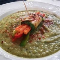 rollitos de calabacin sobre cama de brocolli  at Cookaluzka in Madrid