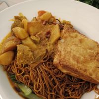 Wantan mee with 'mutton' curry and fried tofu skin. Staff assured that no eggs were used in the noodles and no dairy in the curry. at My Real Cafe in Petaling Jaya