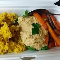 Vegan Bowl, which I´ve taken away to work, but still it was delicious. 
Curry cauliflower rice, hummus and glazed carrot with coriander. 
In general very cory bistro, everyday has a vegan option for lunch and also a soup are vegan, but for sure ask them. 
The crew there is very friendly and nice. 
They also have a vegan desserts in daily offer.
You can pay by credit card or cash.  at Veget in Prague