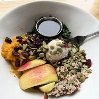 Harvest bowl - cashew cheese in middle  at Nourish Wellness Cafe in Northampton