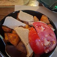 Potatoes and vegan cheese at Mayka in Belgrade