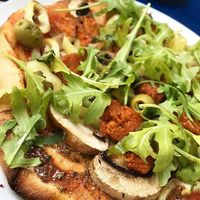 Vegan pizza with smoked Seitan  at Mayka in Belgrade