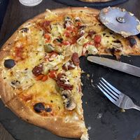 Vegetable pizza with vegan cheese   at Cafe Sia in Isle Of Skye