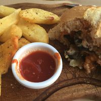 portobello mushroom burger with fries at Nice n Easy in Mykonos