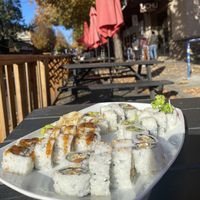 Enoki roll, garden spider roll, green dragon roll, and tofu maki roll.  at UCHU Sushi in Portland