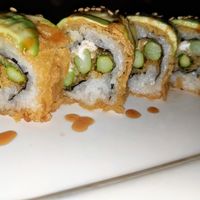 Dragon Roll add vegan cream cheese and deep fried at UCHU Sushi in Portland