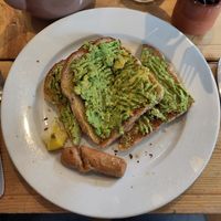 Avocado toast with extra sausage at Green Kitchen in Brighton