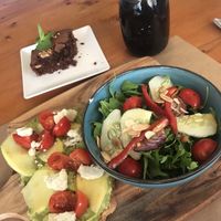 Vegan brownie, vegan toast which comes with salad and the "black magic” smoothie.  at Earth Shop and Cafe in Carvoeiro