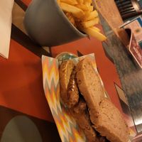 Vegan Sausage Butty and Chips at Quinto Lounge in Sutton Coldfield