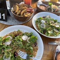 Cauliflower main (tastes like mush nothing) fries were ok, cocktails over priced   at Mowie's  in 