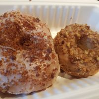 Rum flavour special donut and maple walnut donut. at Cartems Donuts - Kitsilano in Vancouver