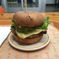 Sausage style burger with tempeh bacon at Next Level Burger - Lake Oswego in Lake Oswego