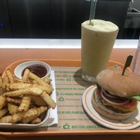 Signature burger, baked French fries, and pumpkin spice milkshake! So good! at Next Level Burger - Lake Oswego in Lake Oswego